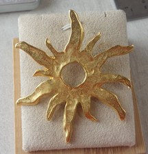 Ancienne broche soleil, en