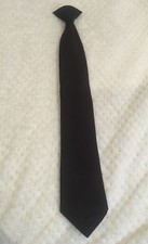 Pince à cravate marron