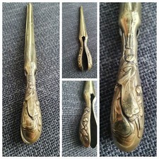 Pince à gants en laiton