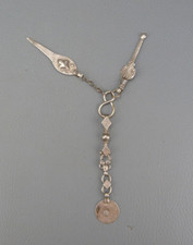 Ancien nécessaire de nettoyage de pipe en argent.