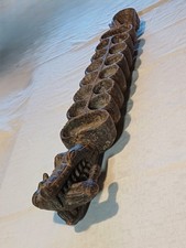 Awalé ancien en bois sculpté