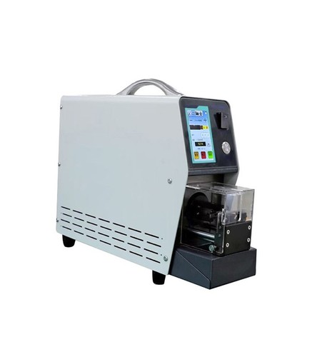 Machine dénuder pour - à,
