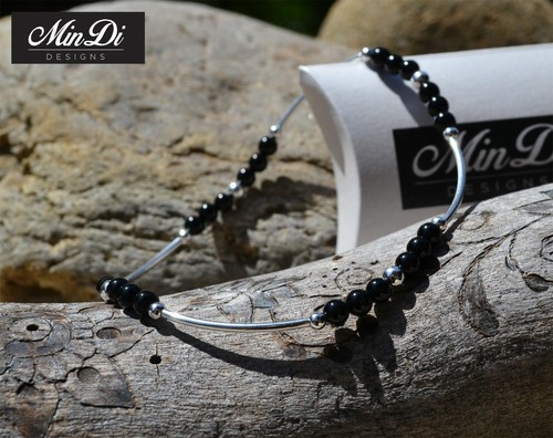 Cheville extensible faite - , à