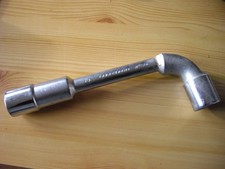 Clé à pipe débouchée