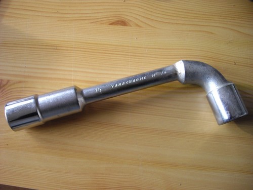 Clé pipe débouchée - à,