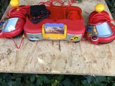 console vsmile vtech rouge, 2  manettes avec jeux cars vf testé et fonctionnelle