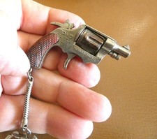 Ancien porte clé Colt Revolver Amorce Midget Romo Hong Kong Fonctionne. Arme.