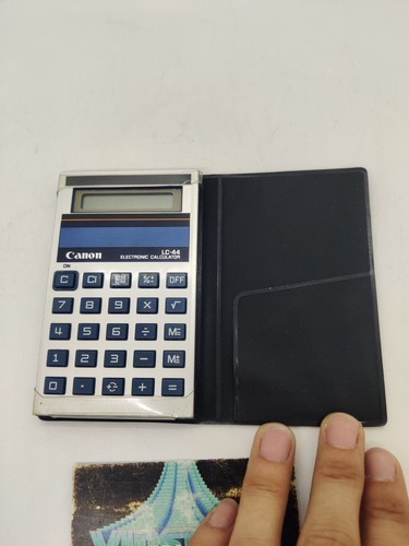 Calculette canon comme - 44,