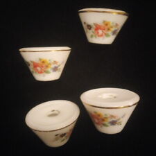 4 bobèches en porcelaine