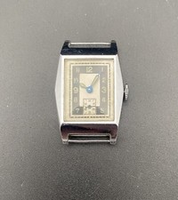 montre art deco mecanique 1930 1940 NOS à reviser chromée 24mm bi-ton tuxedo B16