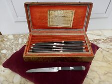 8 couteaux de table 1er Empire ebène garnitures et écussons argent boite cuir