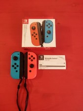 Nintendo Joy-Con Paire de Manettes de Jeu pour Nintendo Switch - Rouge Néon/Bleu