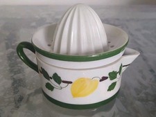 .PRESSE CITRON EN PORCELAINE DE LIMOGES