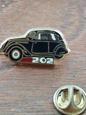 Pin's. PEUGEOT 202.   signe