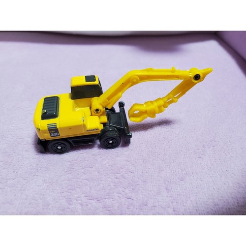 Pelle hydraulique sur pneus