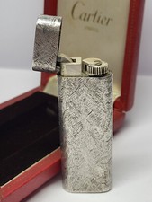 Ancien briquet à gaz ovale