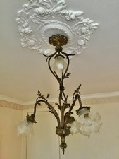Magnifique lustre en bronze feuillages 4 feux