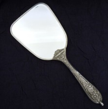 Ancien face à main miroir métal argenté fleurs