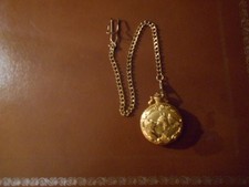 MONTRE DE GOUSSET  TETES DE