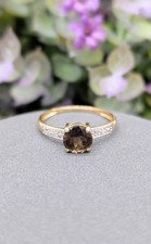 Bague en 2 ors centrée d'un quartz fumé épaulé de 2 petits diamants Or 750 Mill