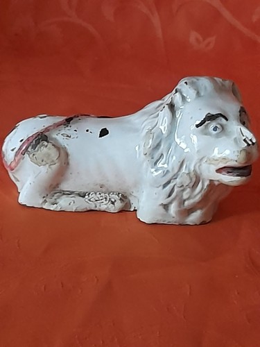 Lion couché faience - couché,
