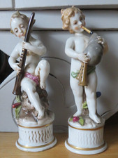 paire d'angelots musiciens porcelaine XIXe N Couronné Capodimonte putti