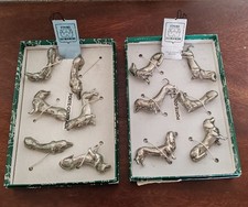 12  Porte-Couteaux chiens Teckels en etain du manoir