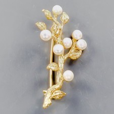 Broche en perles naturelles