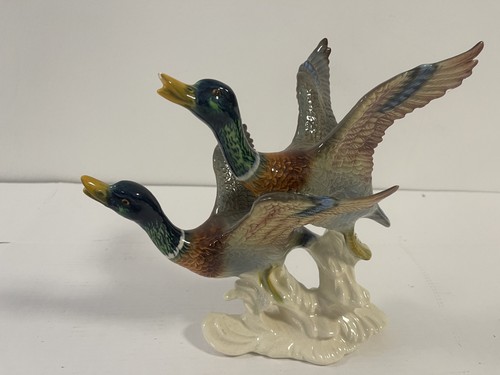 Figurine porcelaine de - en,