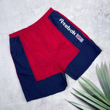 Short de bain vintage Reebok Athletic Dept grand logo bleu marine et rouge ta...