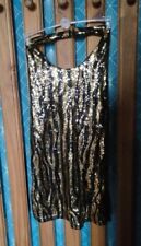 robe tunique noire pailletée de soirée cocktail  dos nu courte or et noire