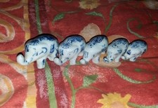 5 éléphants faïence blanche