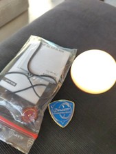 Petite lampe OLIGHT O'BULB avec chargeur et autocollant