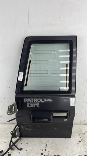 Porte coffre gauche nissan - de,