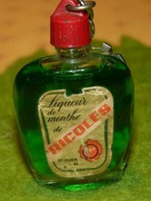 Rare porte clés bouteille en