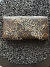 Louis Vuitton : porte monnaie