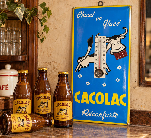 Plaque publicitaire ancienne