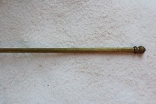 PETITE TRINGLE A RIDEAUX EN BRONZE DORE