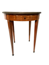 Guéridon rond de style Louis XVI en bois marqueté XX siècle