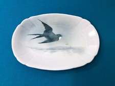 ravier / plat faïence signé