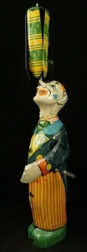 Ancien jouet clown jongleur