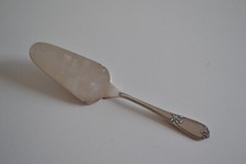 PELLE A TARTE METAL ARGENTE