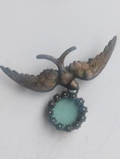 Broche ancienne argentée hirondelle porte photo