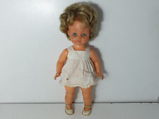 Poupée 33 cm plastique Made