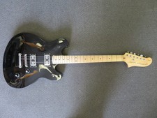 Black Fender Squier Starcaster