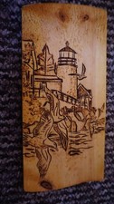 Photo brûlée en bois, pyrographie - Au bord de la mer