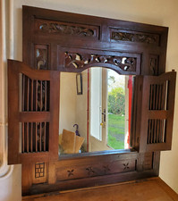 Miroir Balinais vintage à porte volet sculpté à la main 1950. 80/90cm