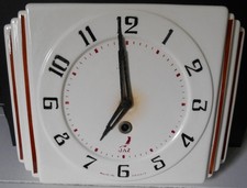 Pendulette  "JAZ"  en faïence avec clé