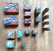 Anciens tampons de broderie en bois (monogrammes,motifs floraux et chiffres)