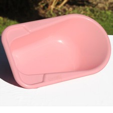 Baignoire rose de poupée